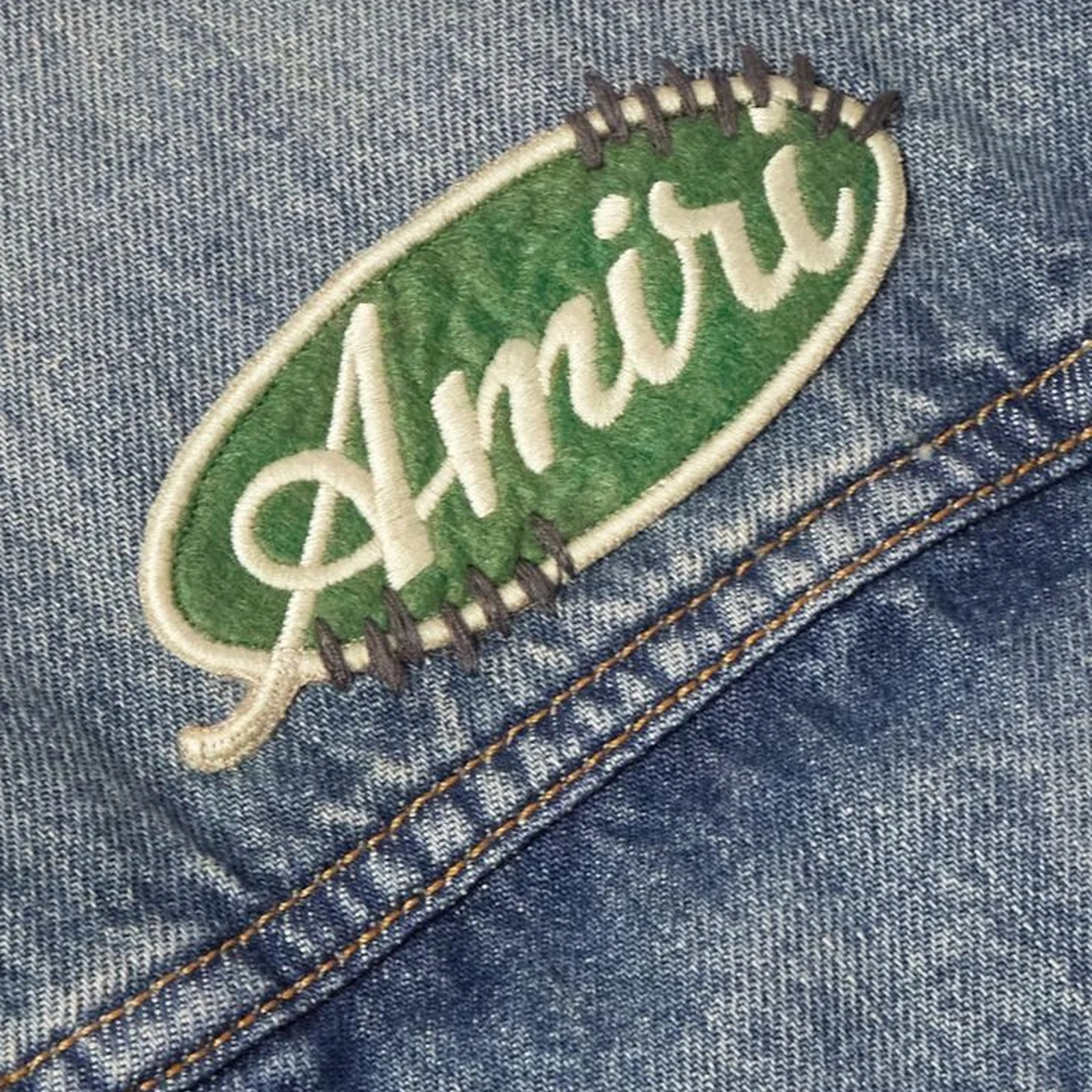Close-up of premium garment stitching and fabric texture